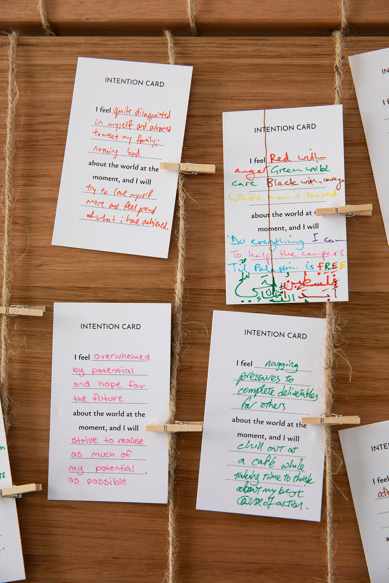 Some examples of intention cards left behind for Transient Threads.
