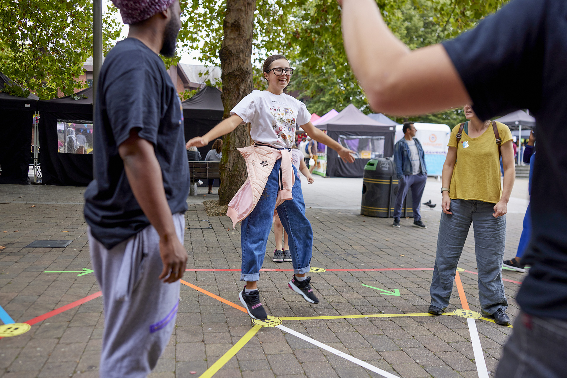A player mid-jump during a game played on the Street Tape Games installation in Waltham Forest, London.