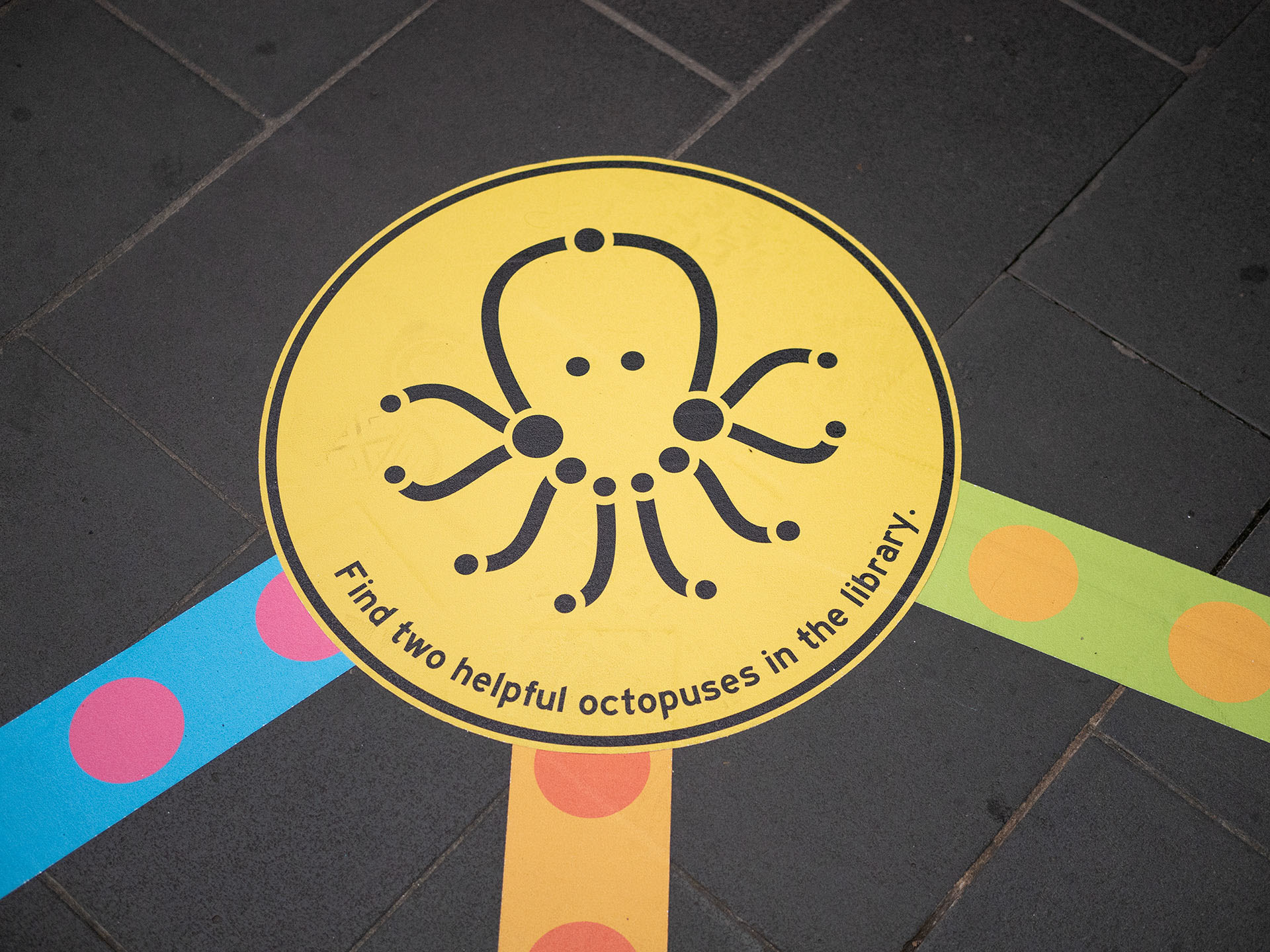 Close-up of the 'Find the octopuses' mini-game from the Rainbow Paths installation at a library pop-up.