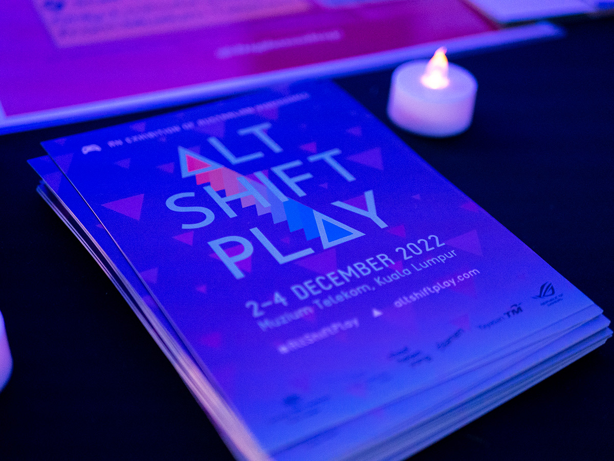 Alt-Shift-Play postcards on a table.