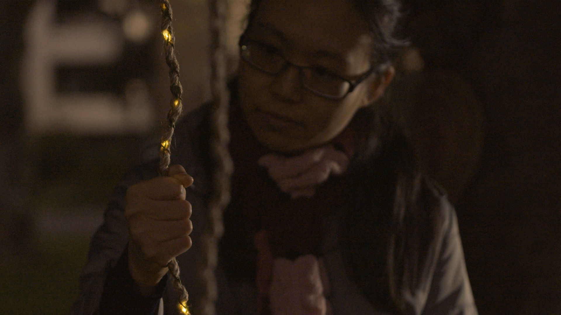 Close-up of player touching a rope sensor.