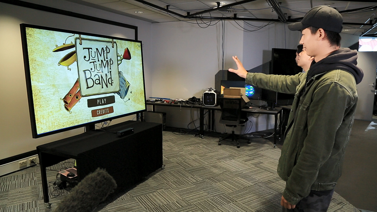 A player controlling the menu using the Kinect in Jump Jump Band.