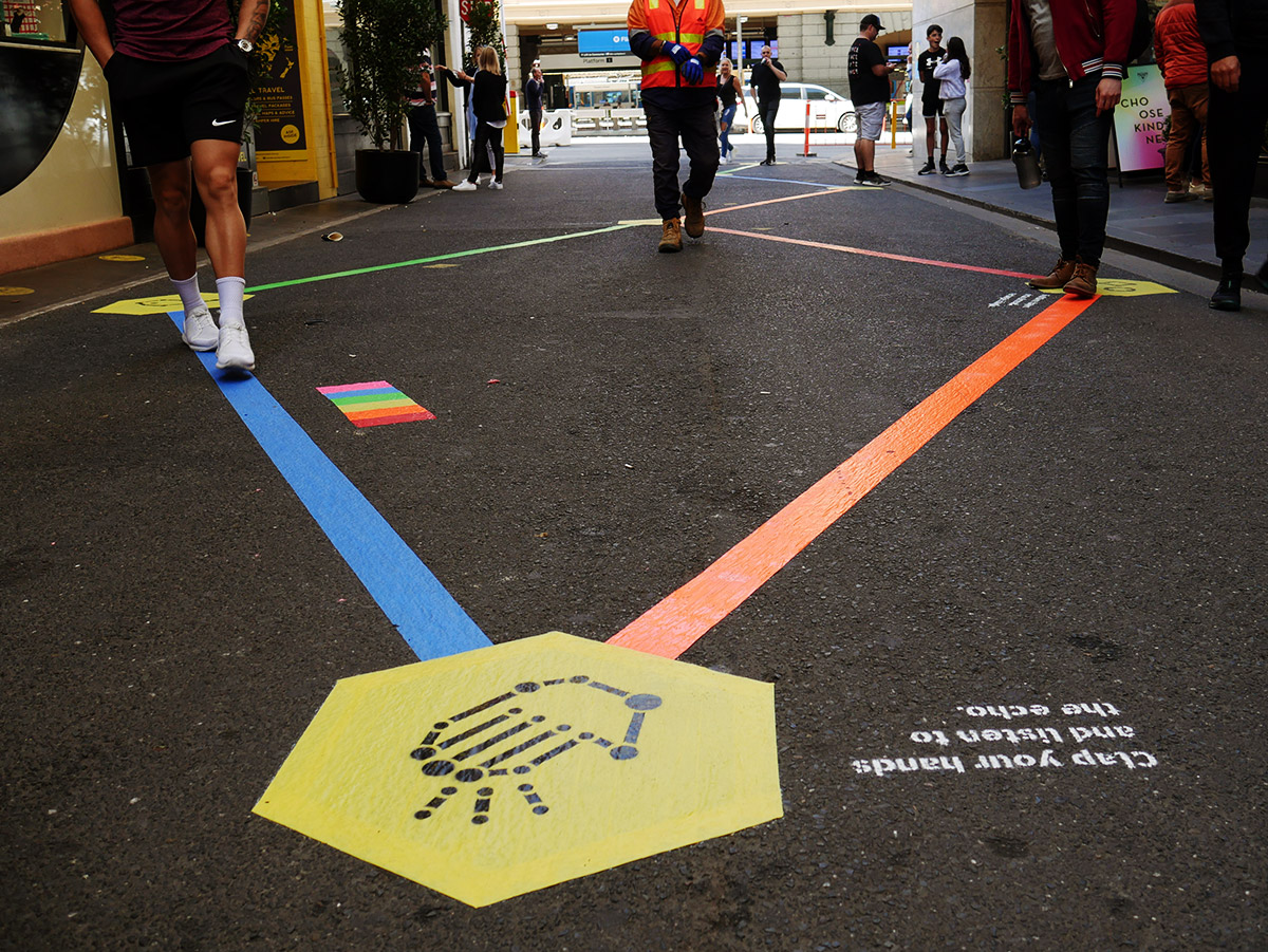 Close-up of two paths diverging from a mini-game of the Rainbow Paths installation on Degraves St.