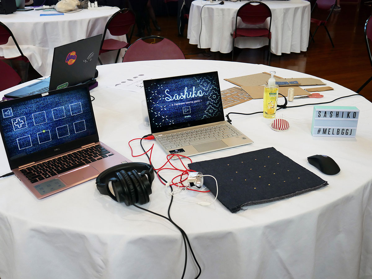 Wide shot of the Sashiko booth at the Play Party.