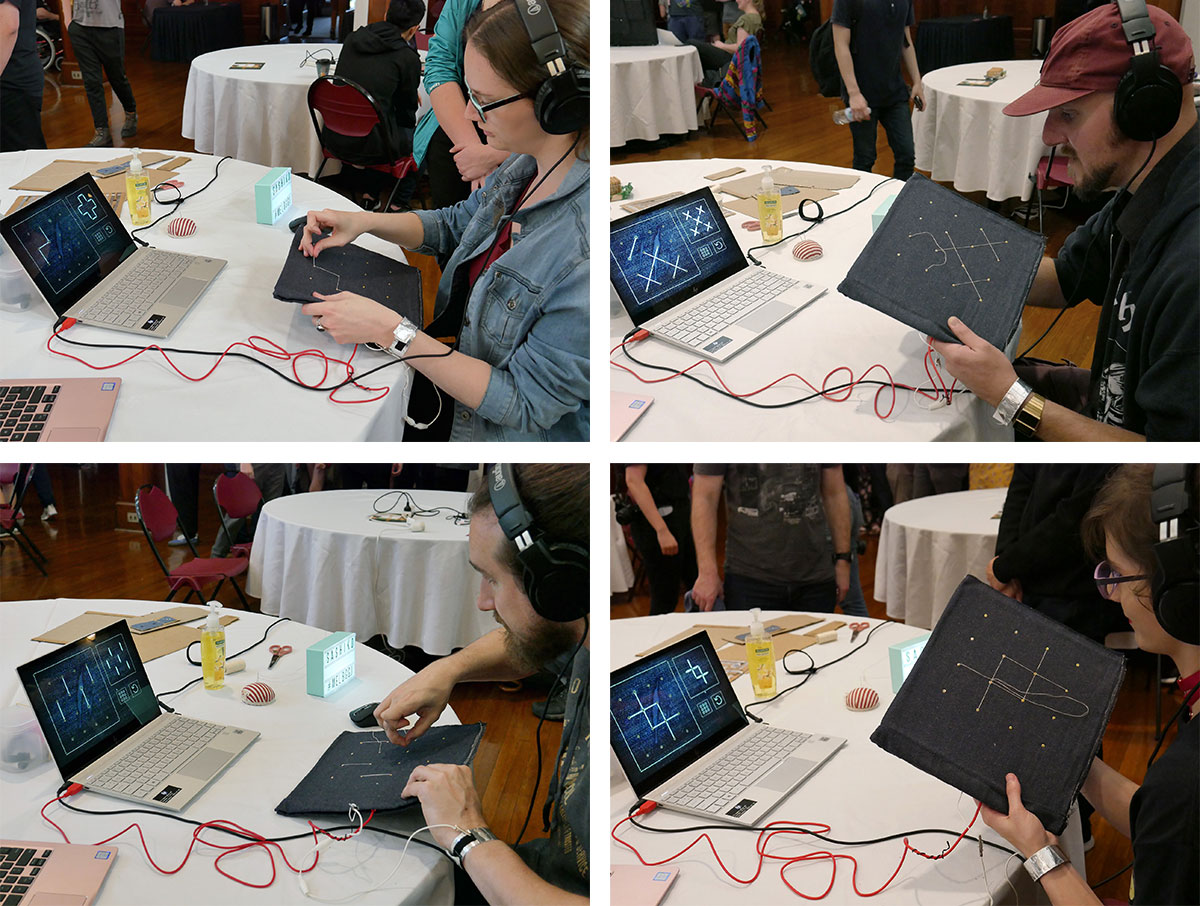 Players sewing using the Sashiko controller while playing Sashiko at the Play Party.