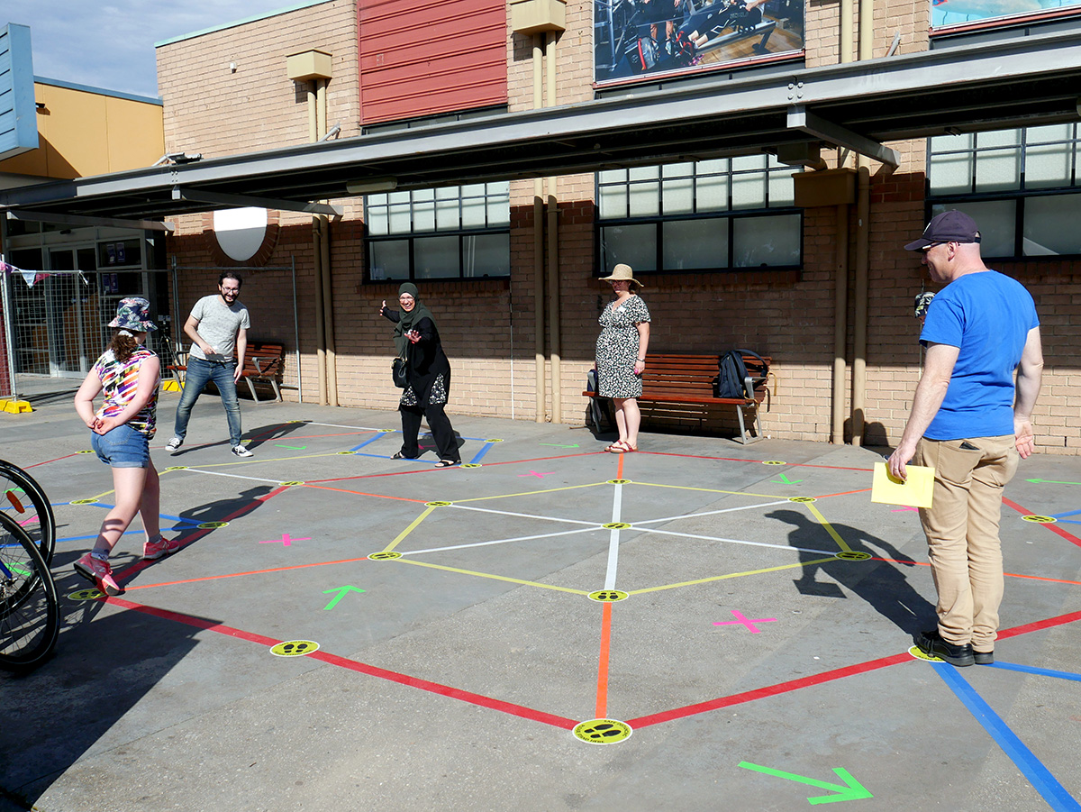 Players interacting with one another on the playspace.